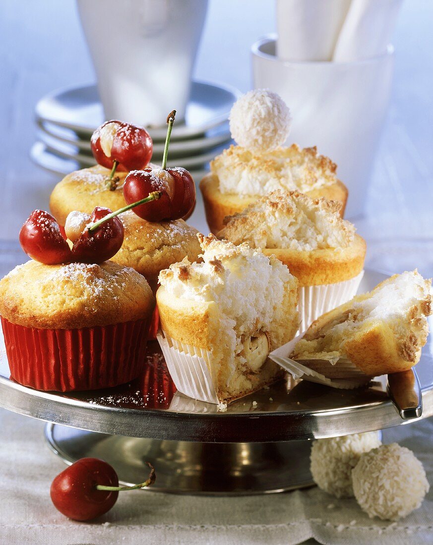 Cherry and marzipan muffins and coconut meringue muffins