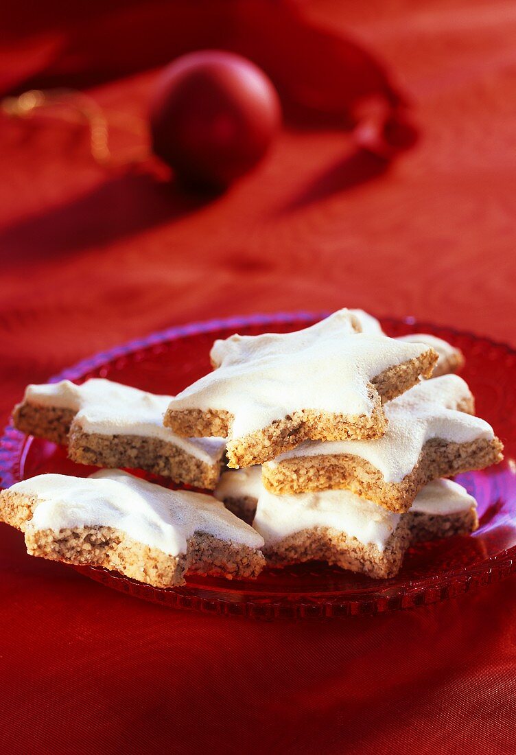 Cinnamon stars on red plate