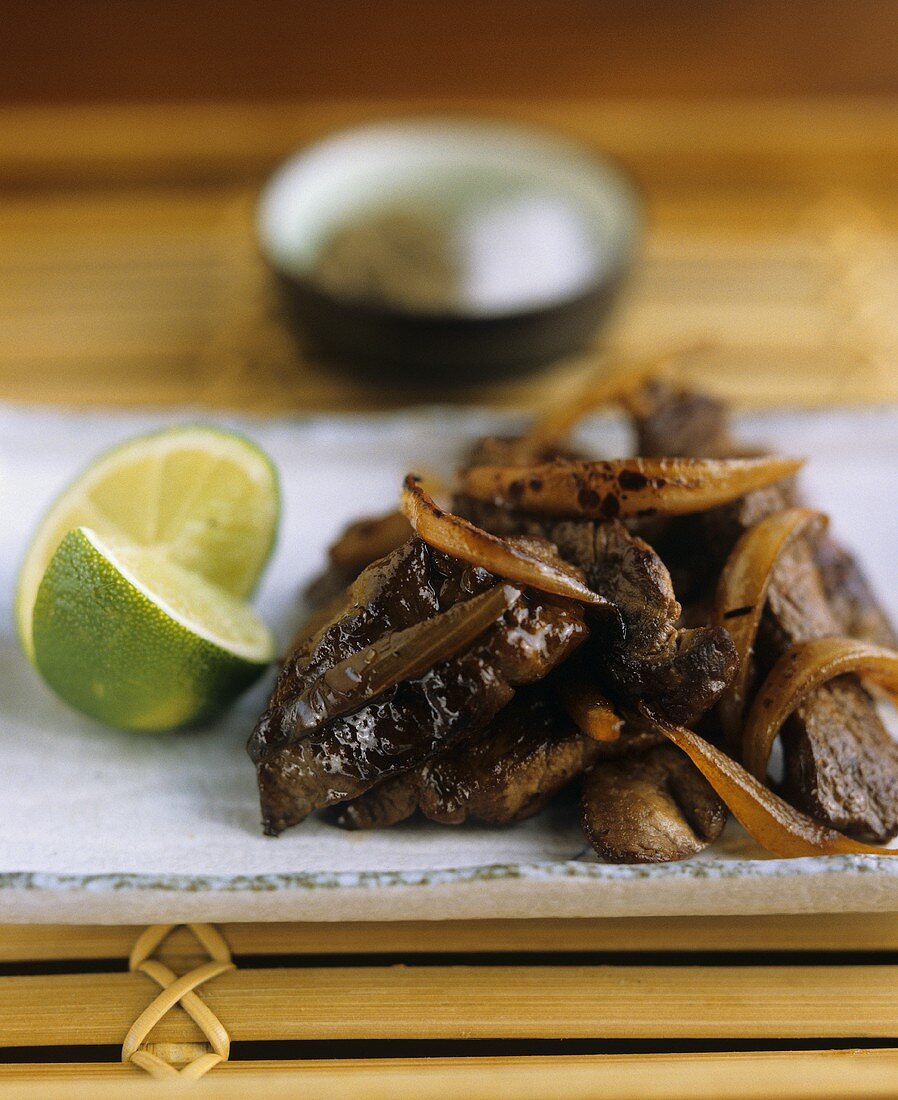 Fried beef with onions and lime (Vietnam)