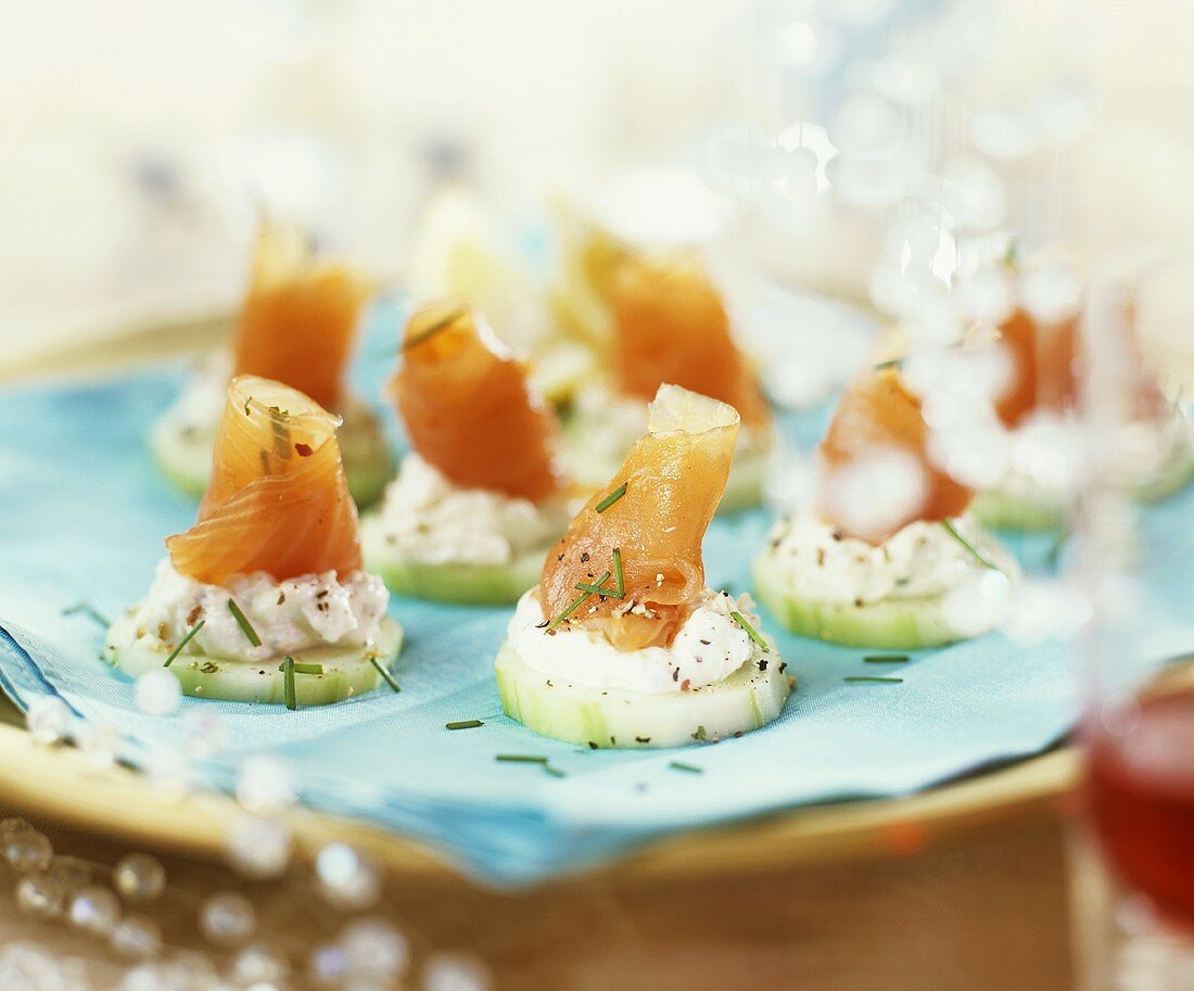 Salmon with soft cheese on cucumber slices