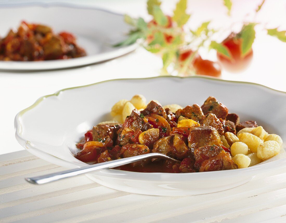 Braised meat with tomatoes