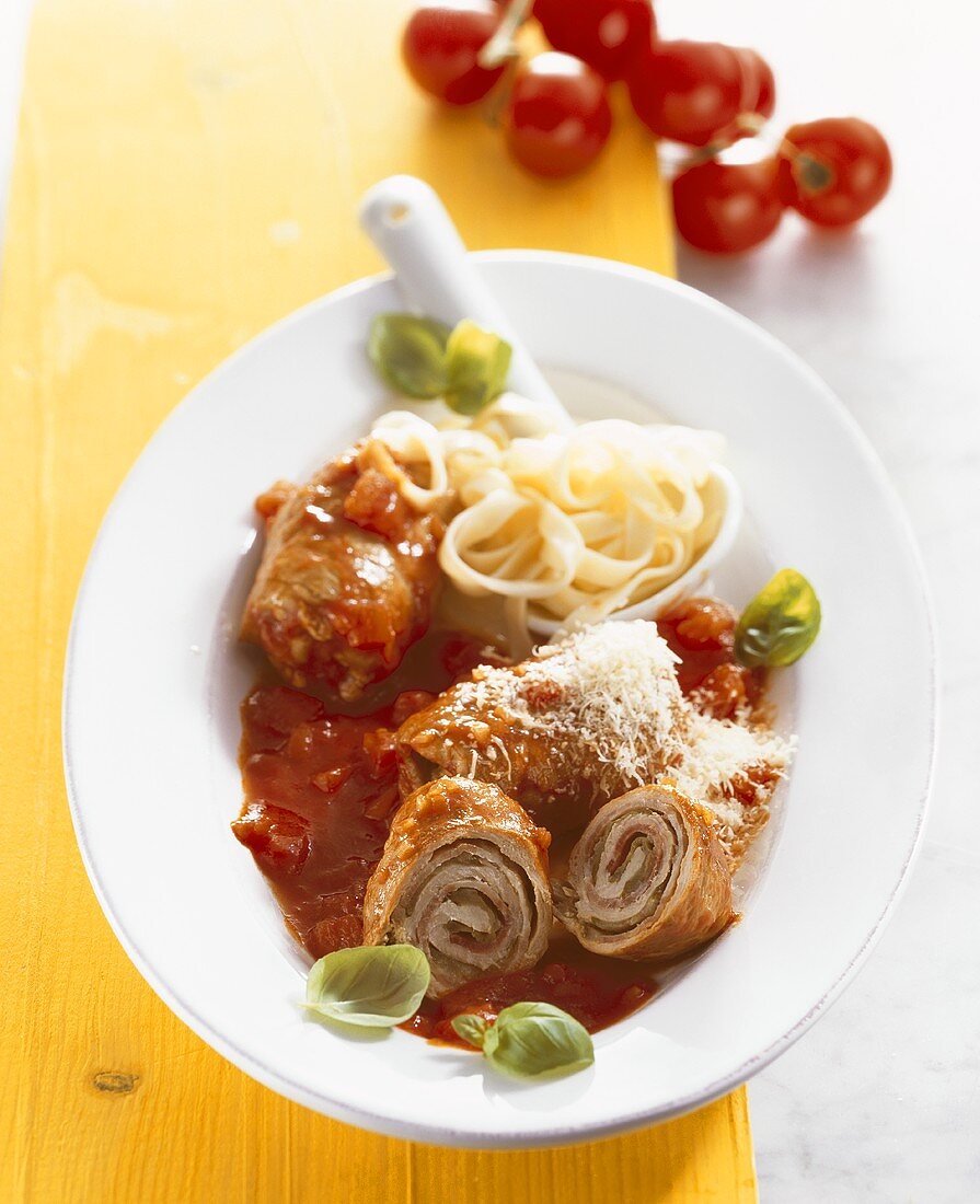 Roulades in spicy tomato sauce with ribbon pasta