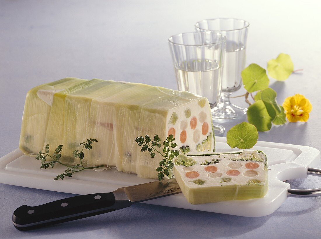 Vegetable terrine, partly sliced