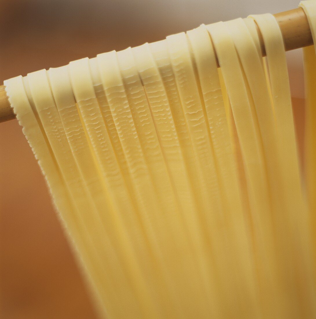 Fresh ribbon pasta hanging up