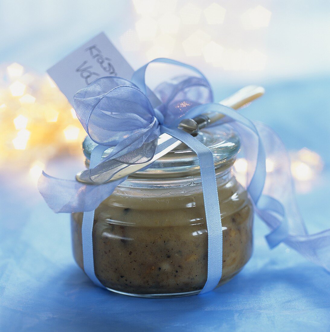 Pork lard in a jar with a bow