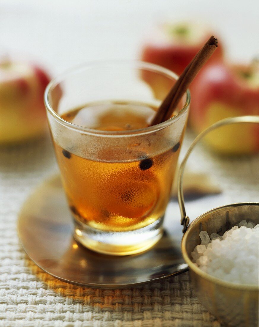 Apple punch with coffee beans and cinnamon