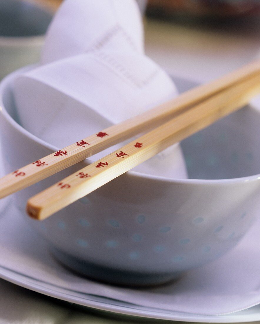 Asian Bowl with Chopsticks and Cloth Napkin