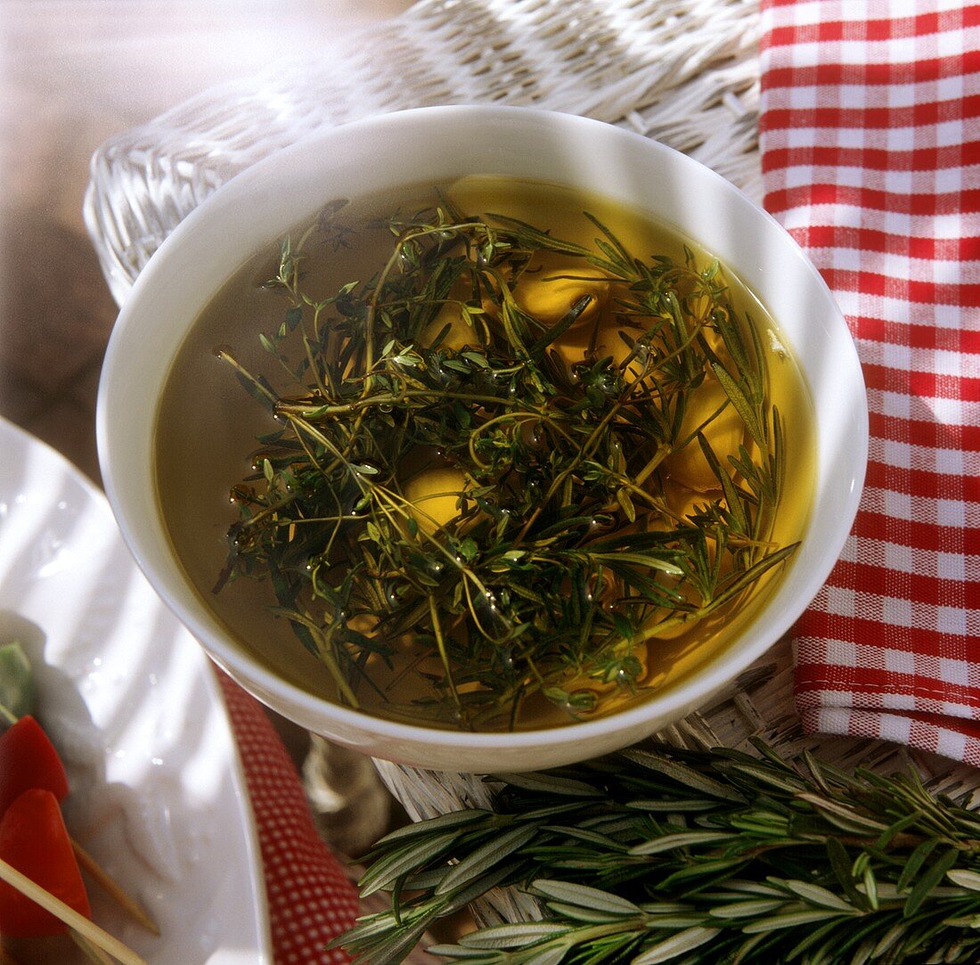 Olive oil and herb marinade with rosemary, thyme and oregano