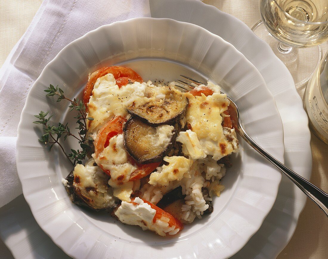 Rice casserole with tomatoes, aubergines & sheep's cheese