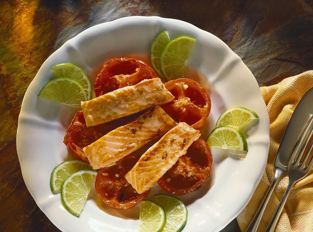 Salmon on tomato & ginger confit with lime slices