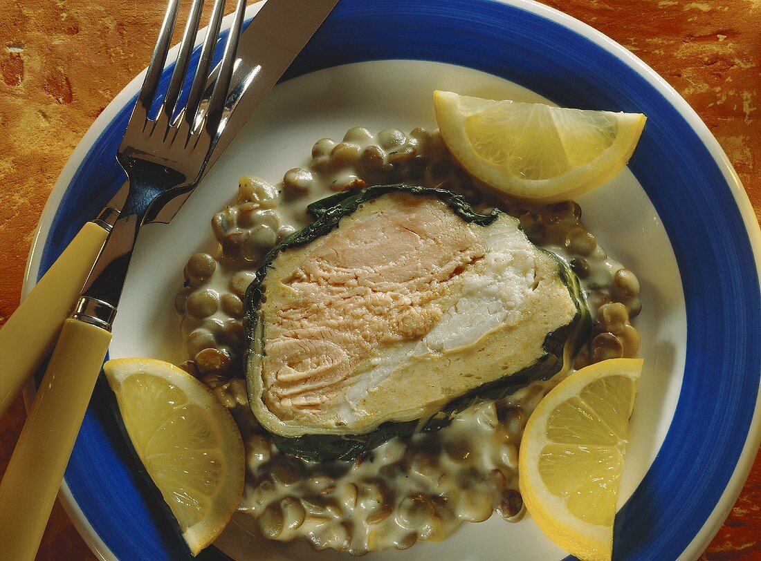 Salmon, pike-perch & spinach strudel with lentils & lemon