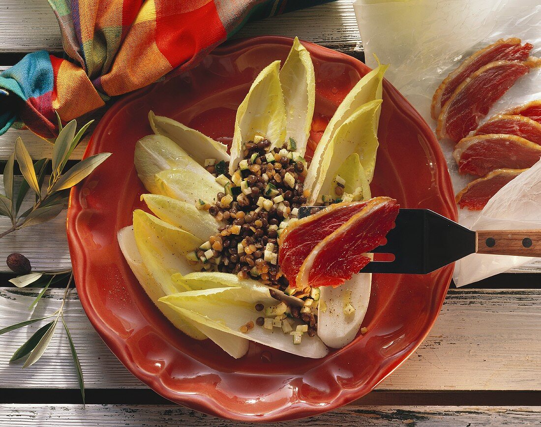 Lentil salad with smoked goose breast