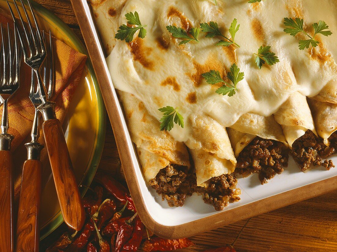 Baked pancakes with mince filling