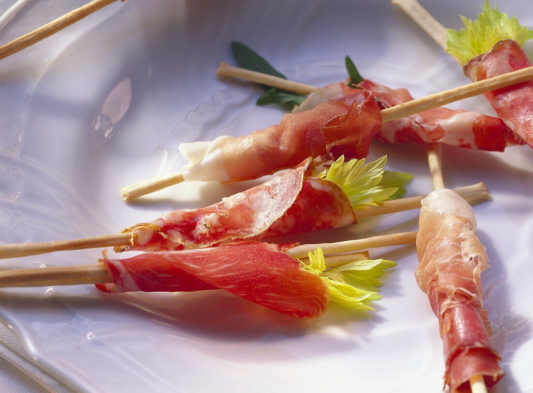 Prosciutto e grissini (wrapped grissini, Italy)