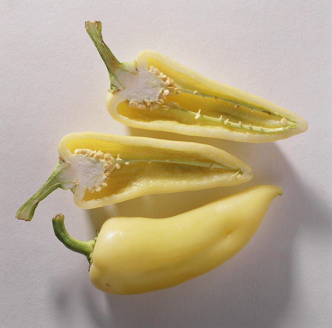 One  hole & two half yellow pointed peppers