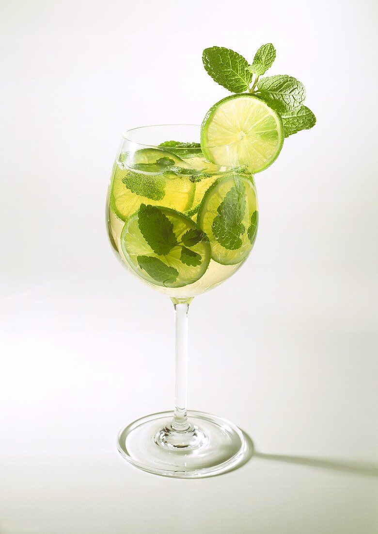 Herb punch with lemon balm & lime slices