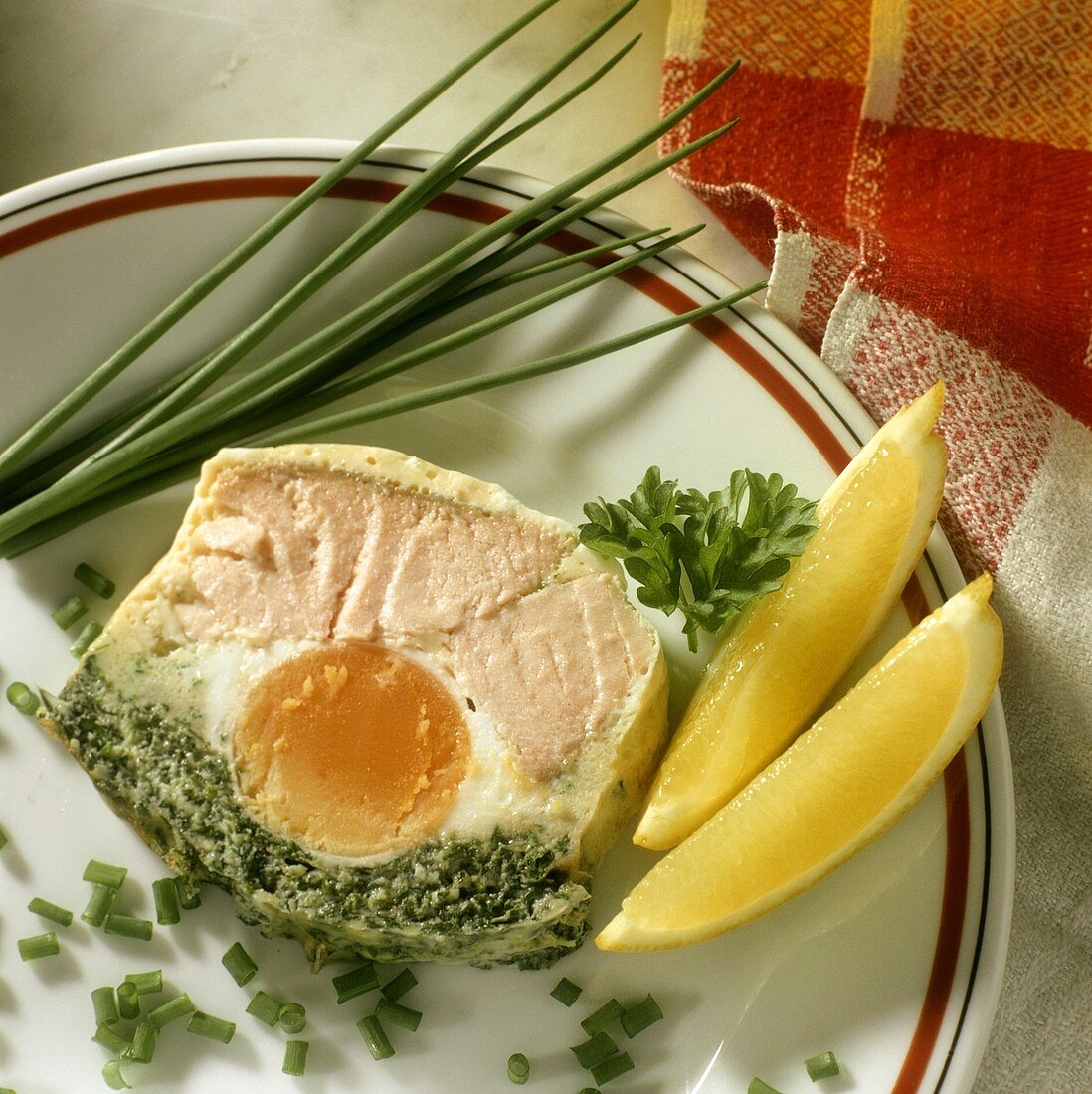 Fish and herb terrine with hard-boiled egg & chives