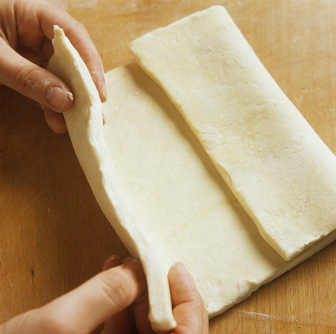 Making puff pastry (folding to the middle)