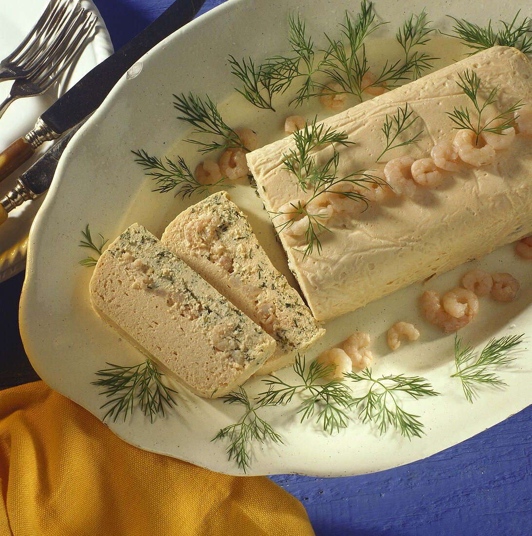 Salmon terrine with shrimps and sprigs of dill
