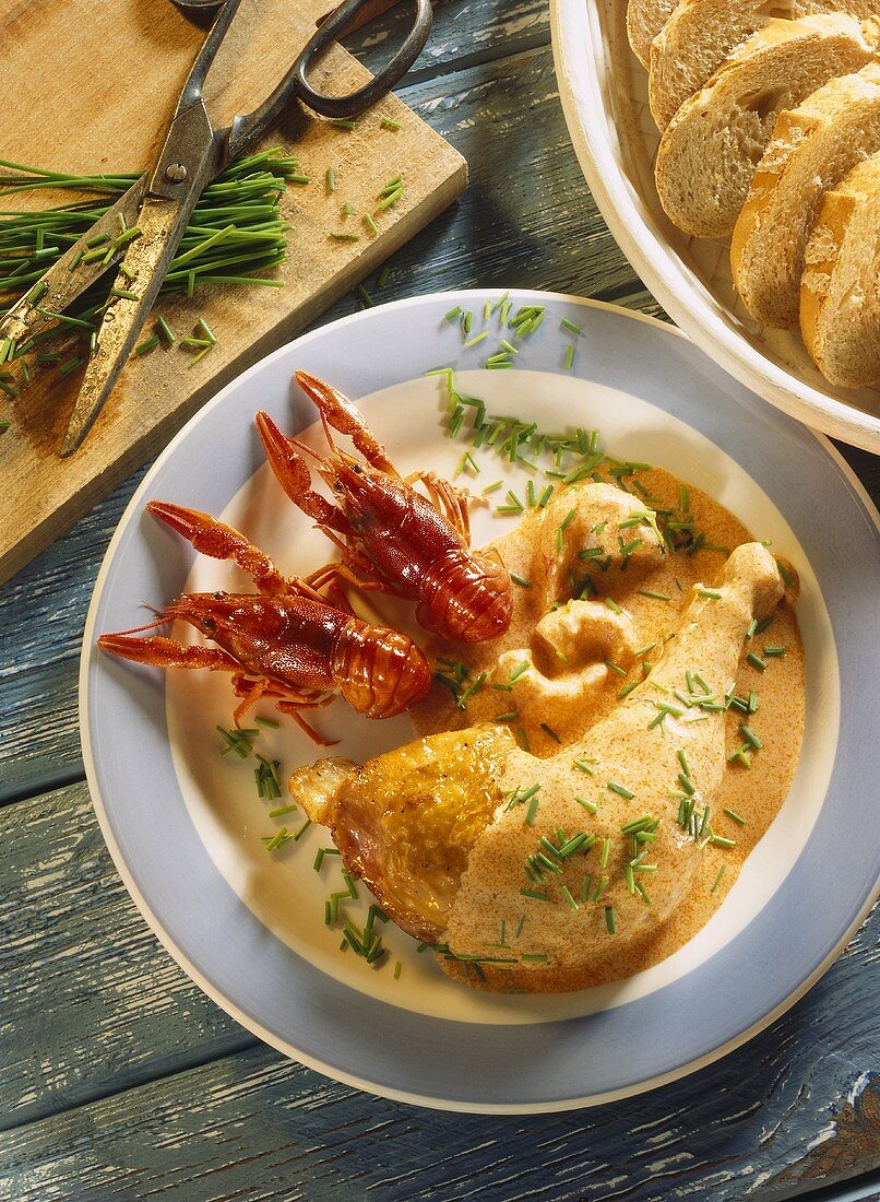 Chicken leg with crab sauce, crab and chives