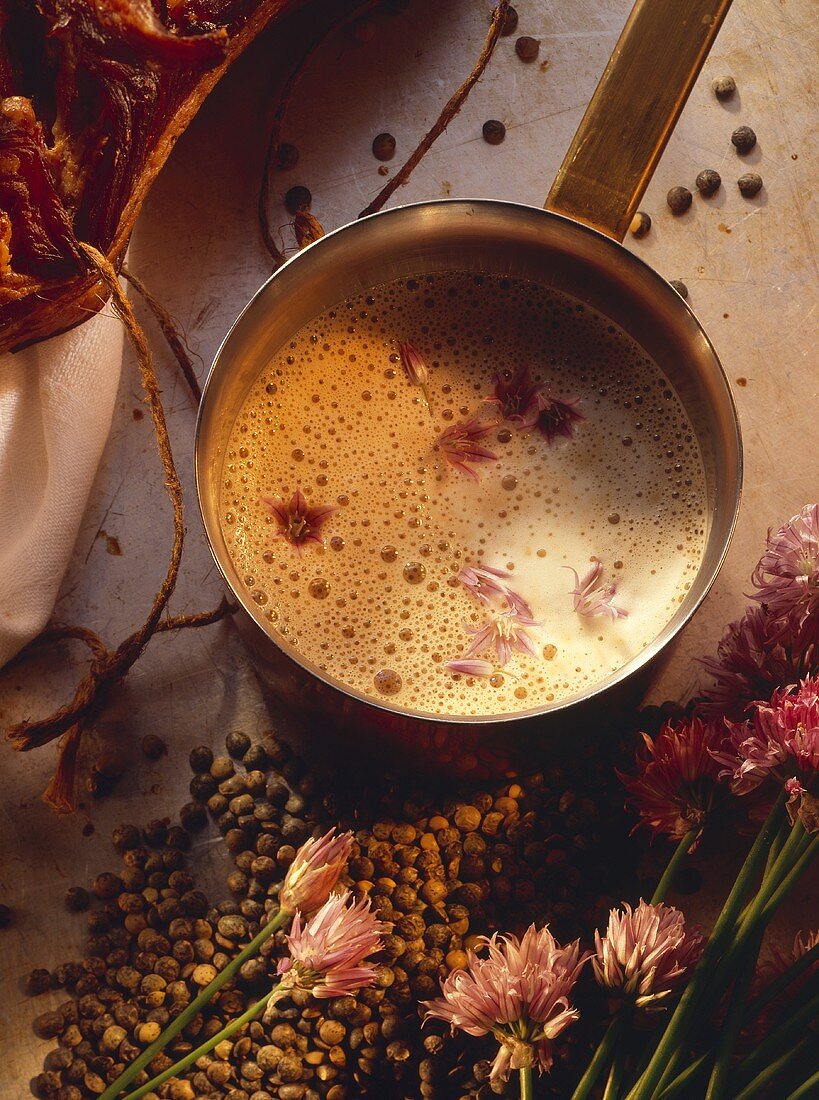 Cream and bacon sauce with chive flowers
