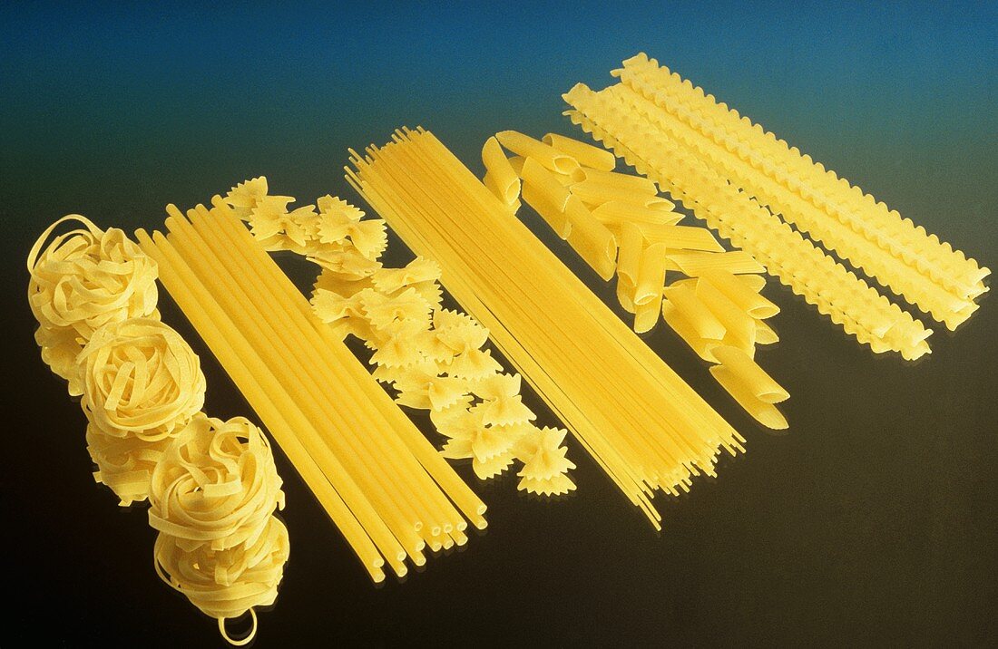Spaghetti, pasta nests, macaroni, farfalle, penne, reginette