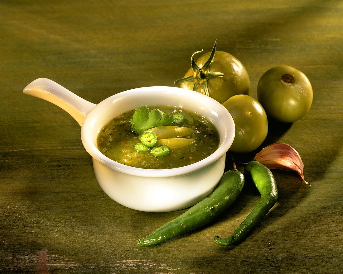 Salsa verde: spicy sauce with green tomatoes & chili peppers