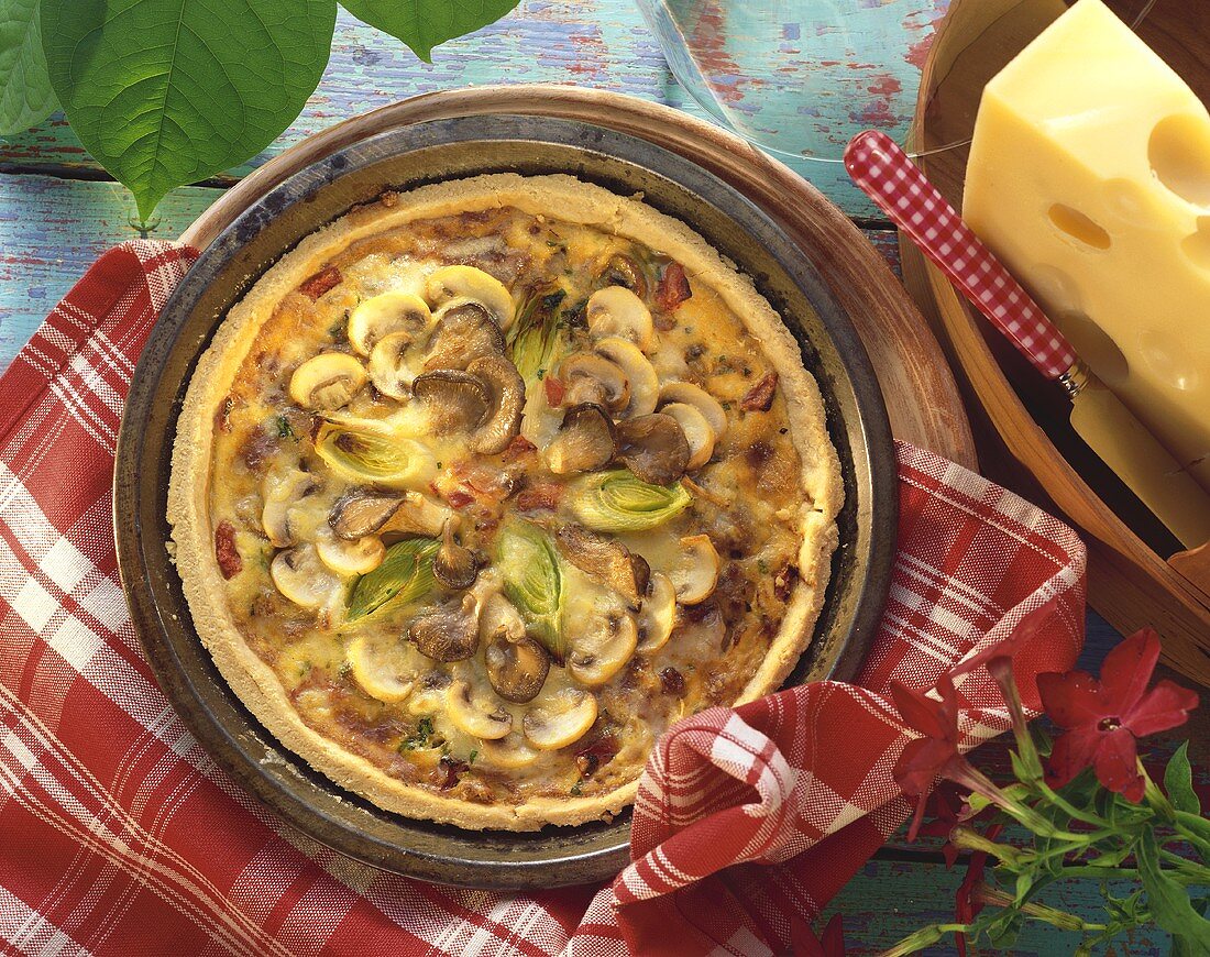 Mushroom quiche with leeks and cheese