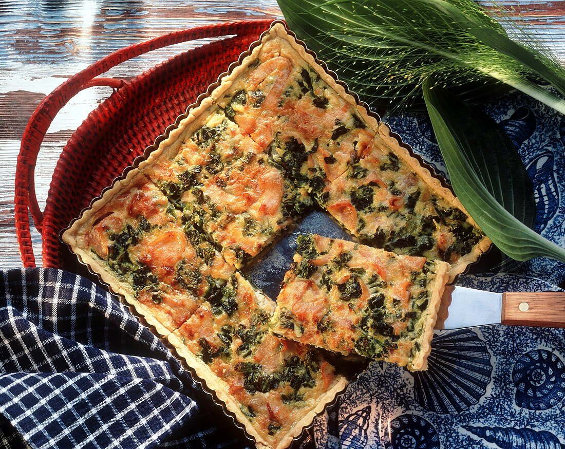 Spring onion tart with smoked salmon in baking dish