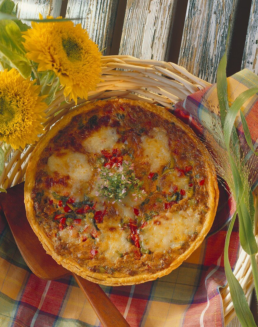 Savoury mince quiche with peppers and oregano flowers