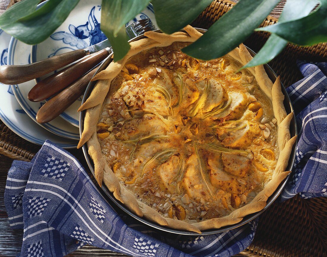 Exotic tart with chicken breast, celery, physalis, almonds