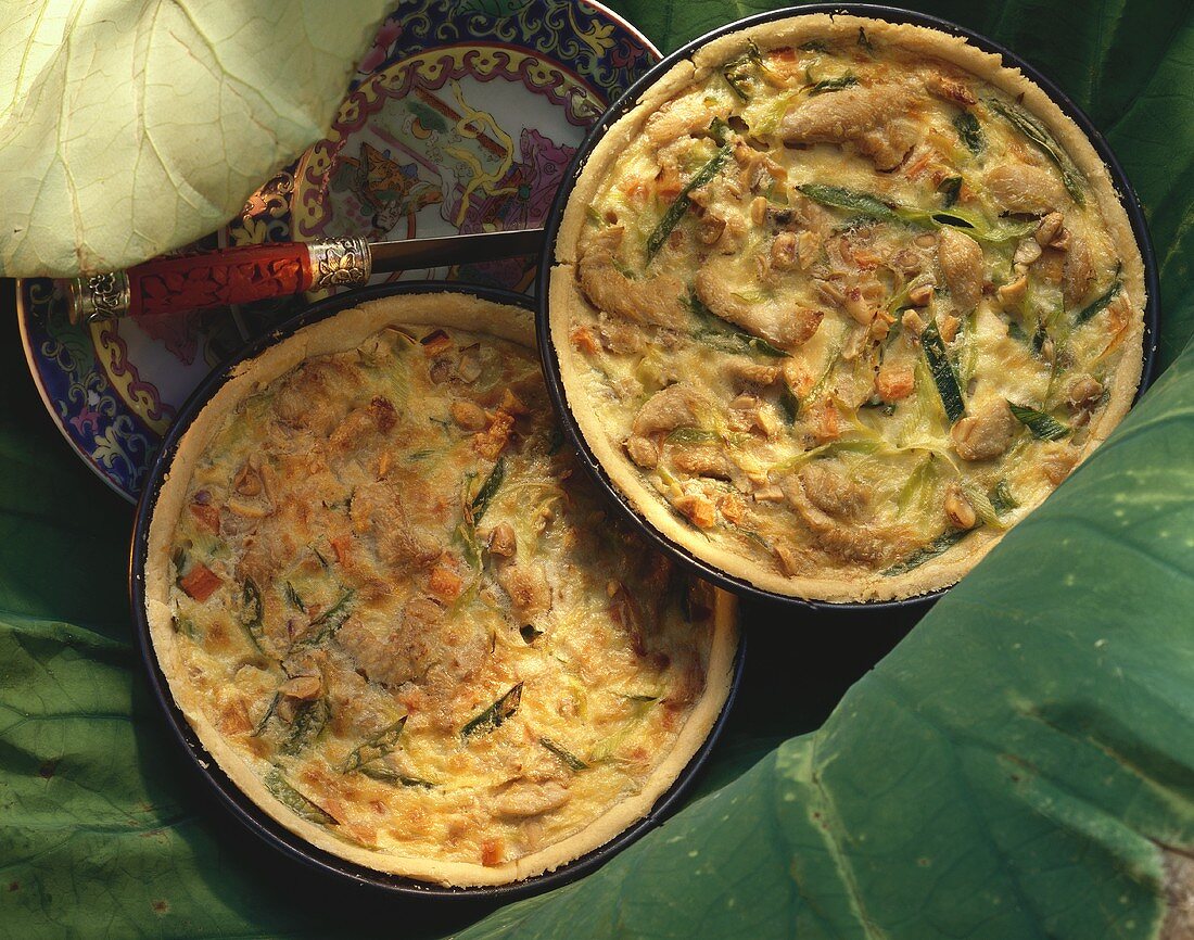 Peanut quiche with turkey (two quiches in baking dishes)