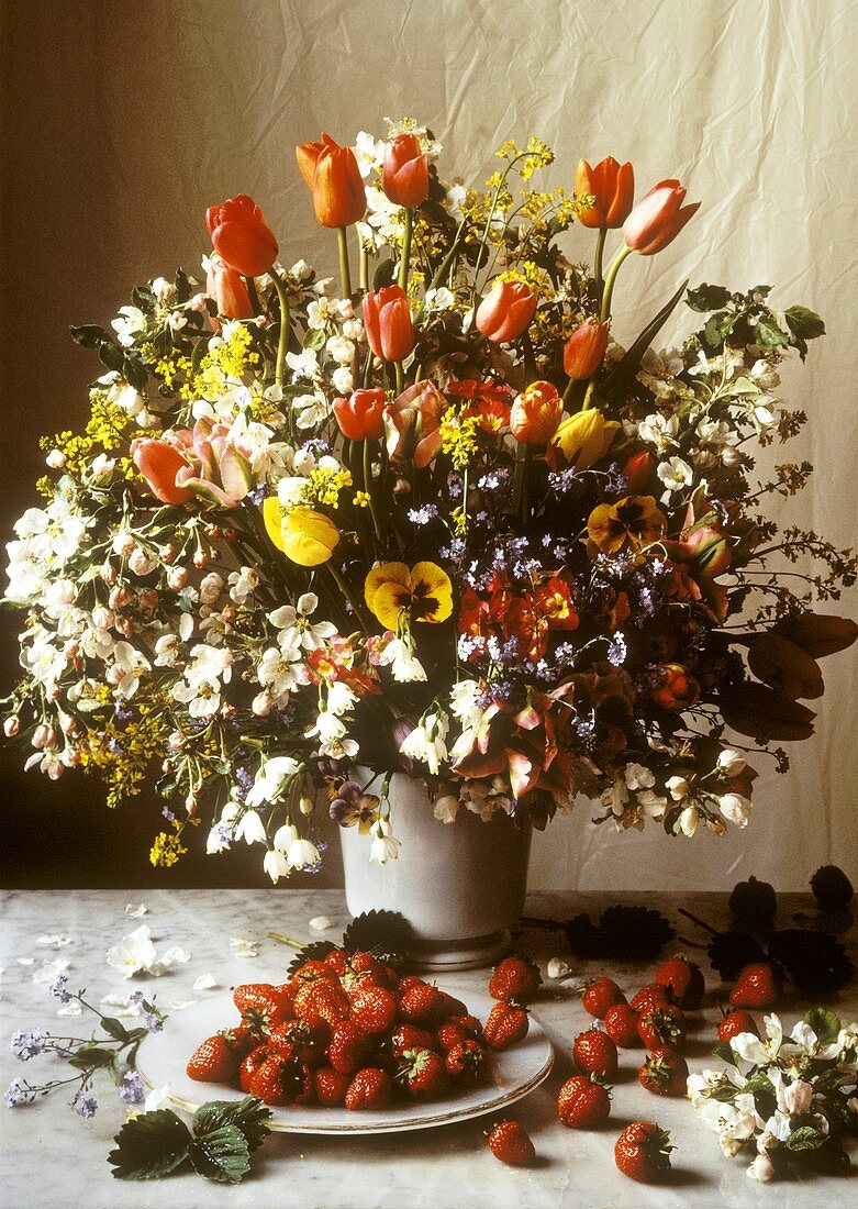 Floral Arrangement with a Full Dish of Strawberries