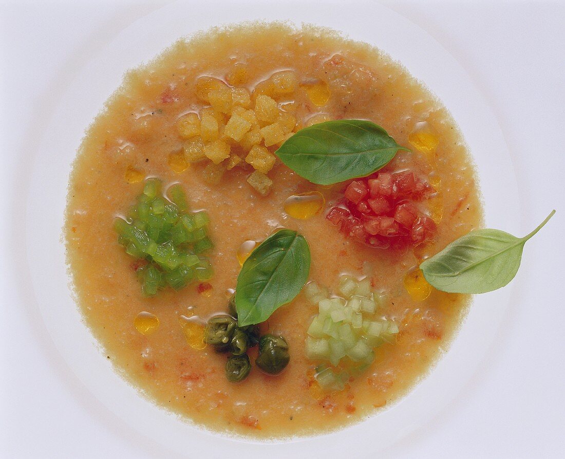 Gazpacho andaluz with vegetable & bread cubes, capers & basil