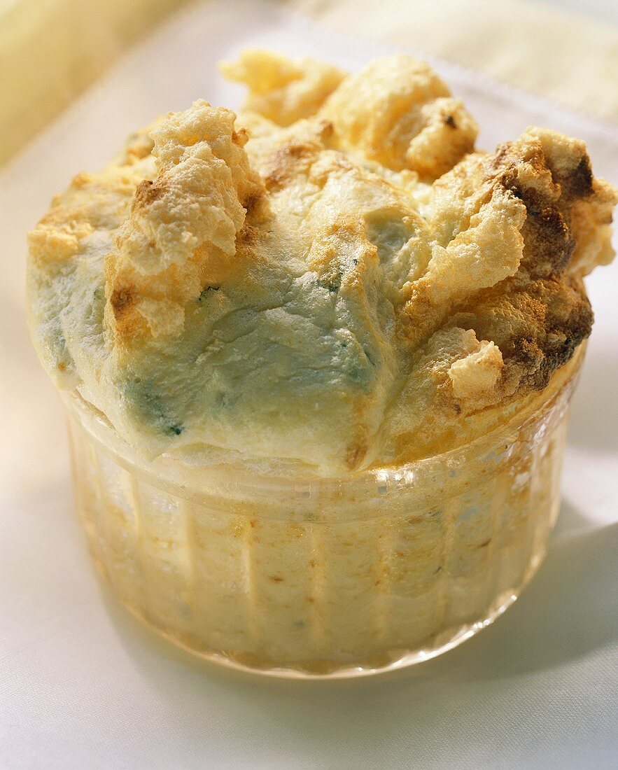 Quark souffle with sheep's cheese in souffle dish