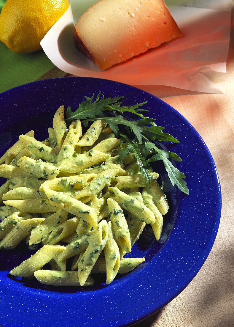 Penne with rocket pesto, pecorino and rocket leaves