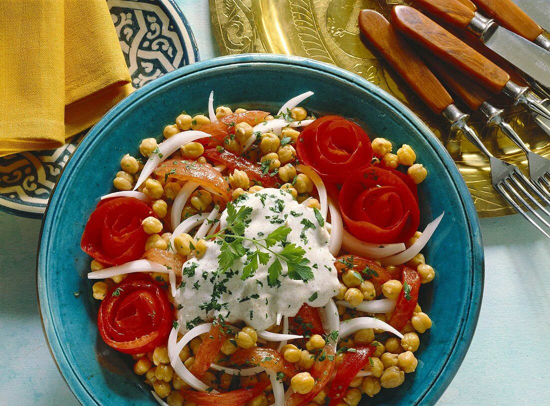 Chick pea salad with yoghurt sauce & tomato flowers