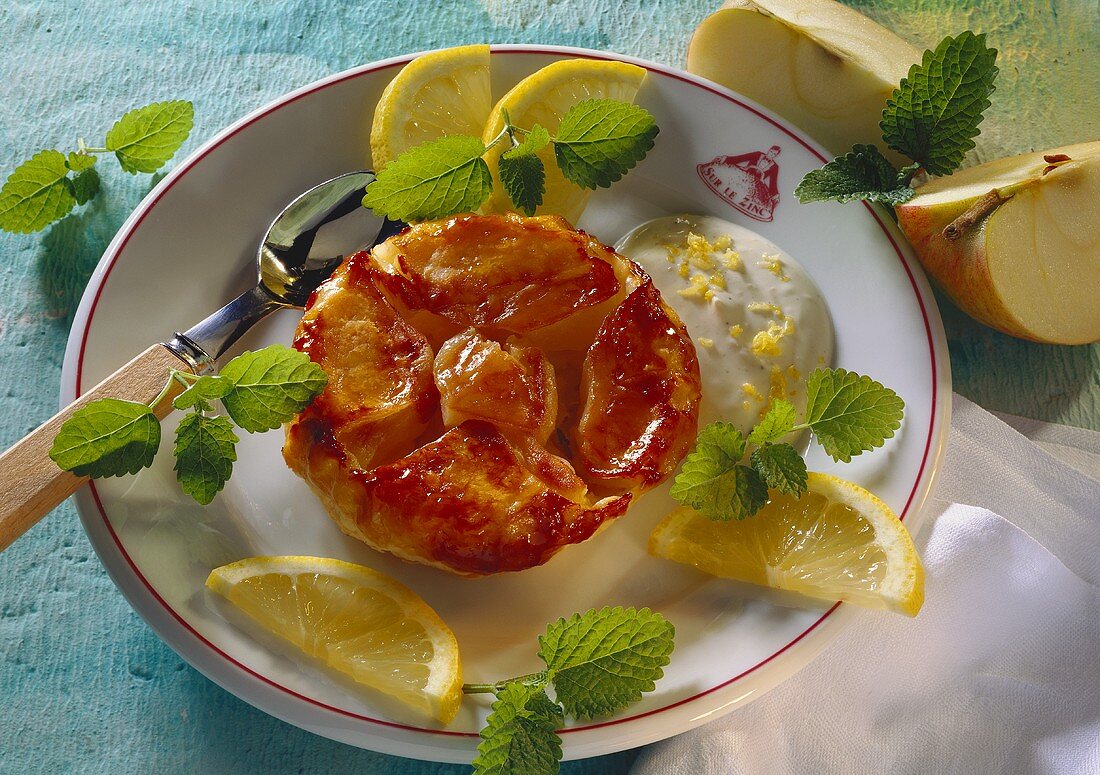 Mini-apple tart with lemon cream, lemons & lemon balm