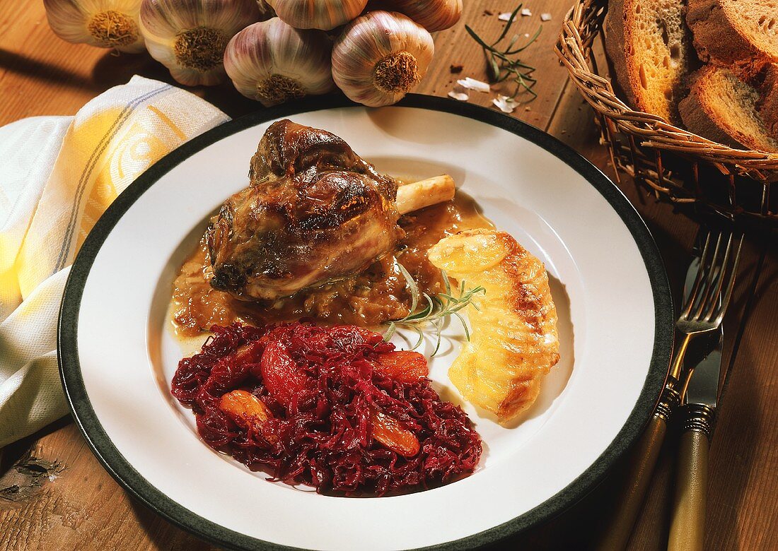 Lamb shank with red cabbage & apricots and potato gratin