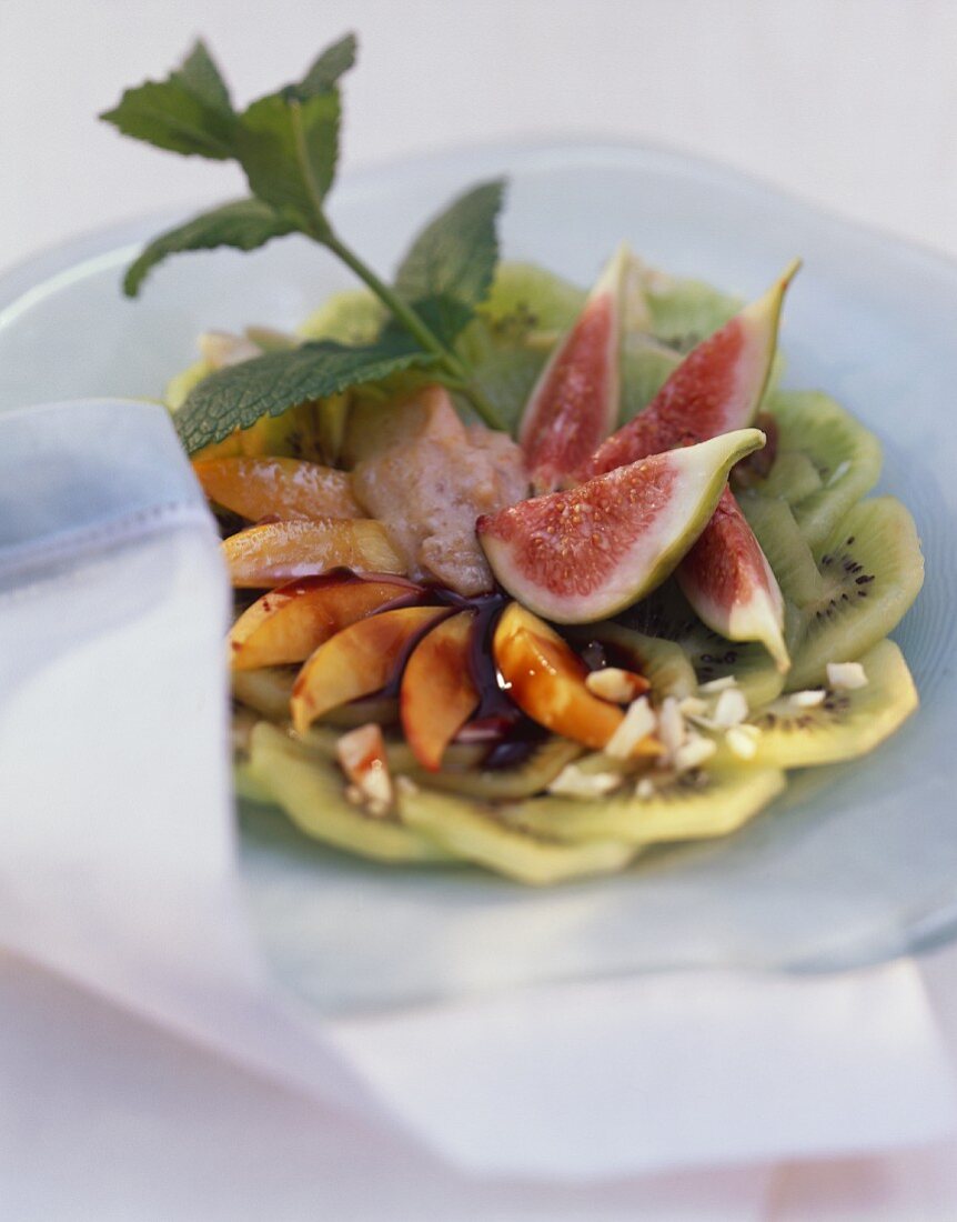 Kiwi & fig salad with banana mousse, nectarines, almonds, mint