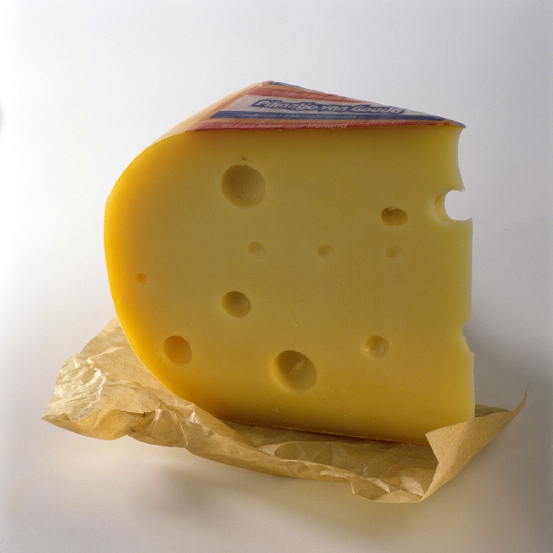 A piece of Gouda on paper