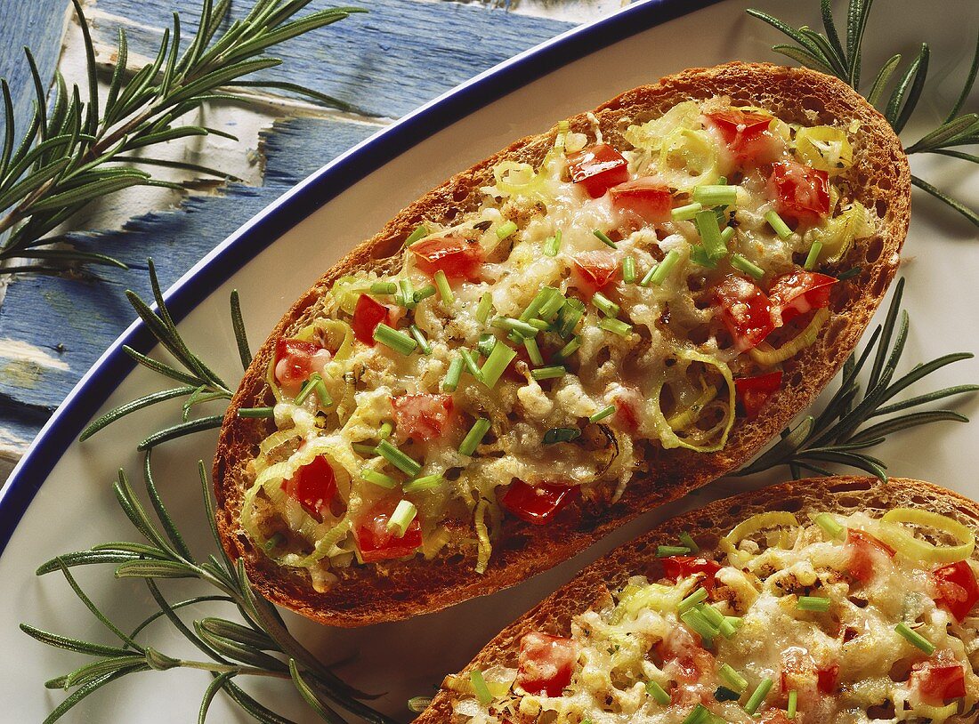 Toasted grain baguettes with vegetables and cheese