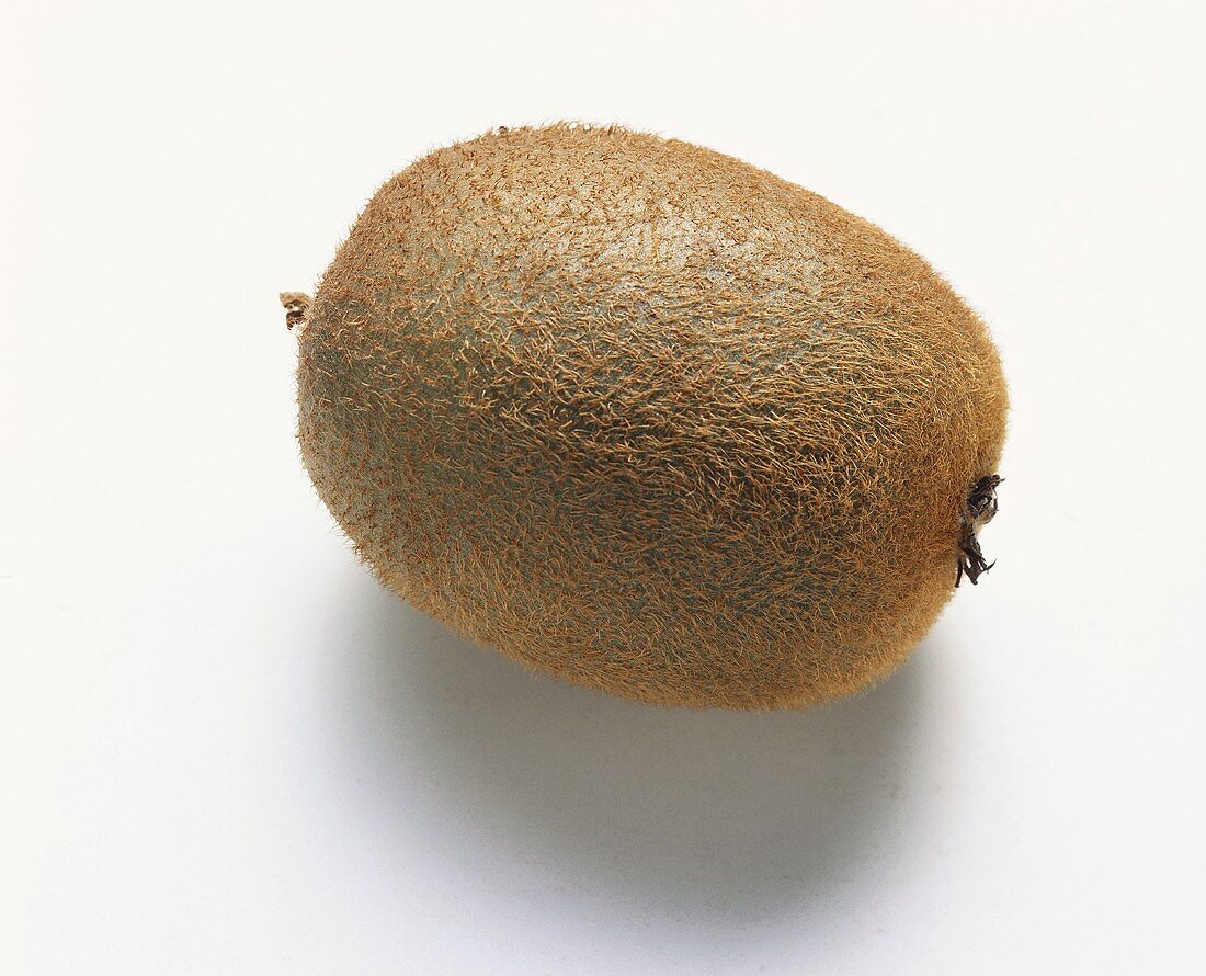 A kiwi fruit on light background