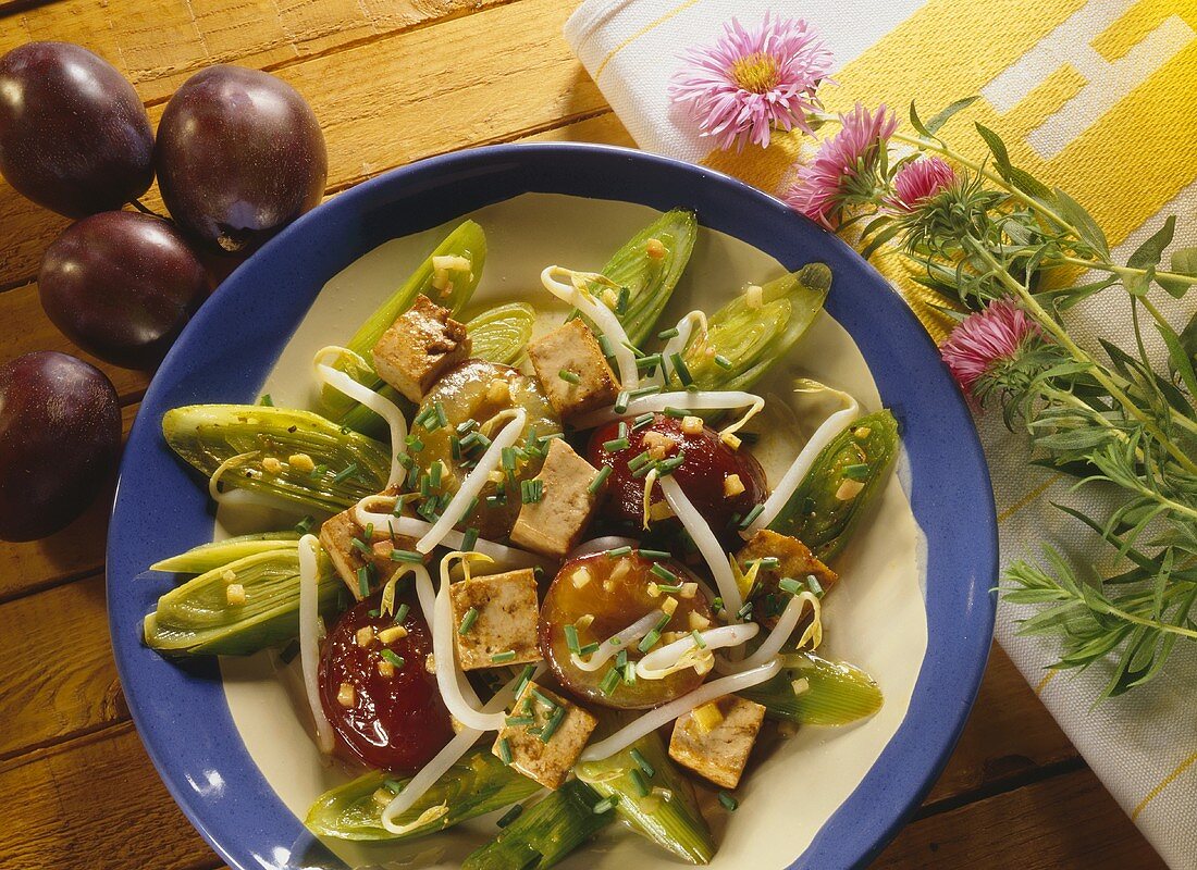 Plum and leek curry with tofu and sprouts