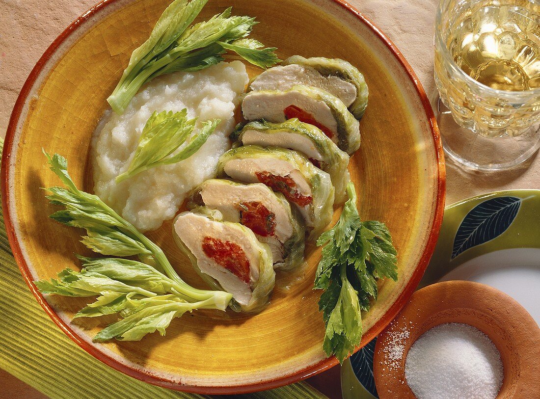 Steamed chicken parcels in iceberg lettuce with celery sauce