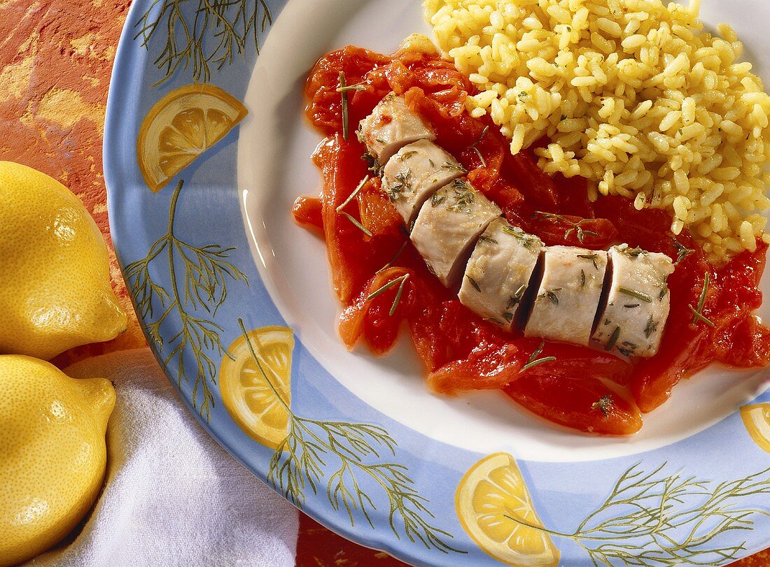 Marinated rabbit fillet with tomatoes and saffron rice