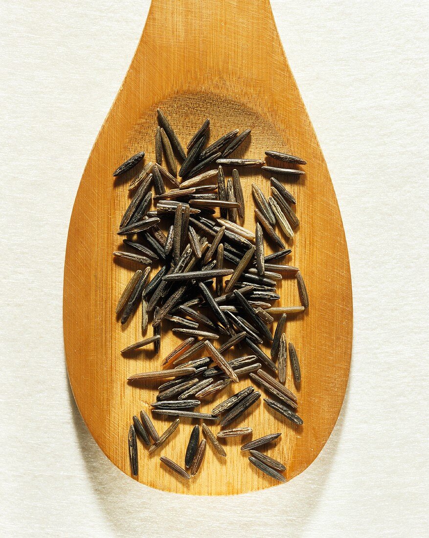 Wild rice on a wooden spoon