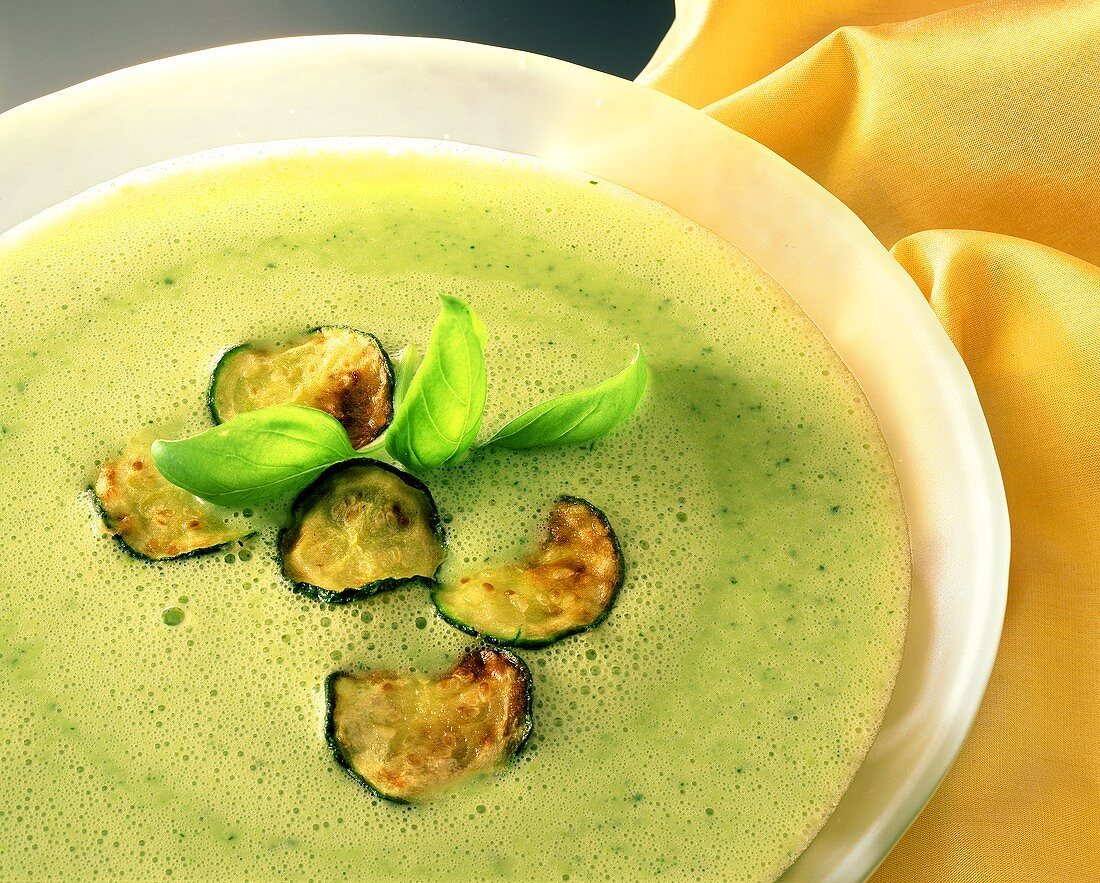 Courgette foam soup with fried courgette slices
