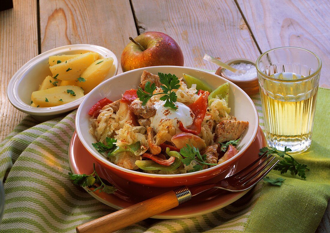 Turkey and sauerkraut goulash with peppers and apples