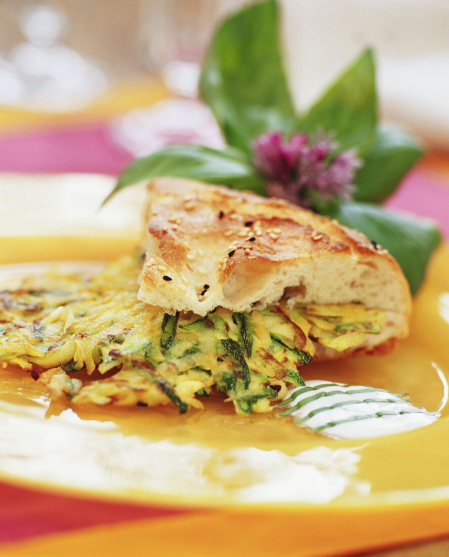 Flat bread with courgette cakes and garlic quark